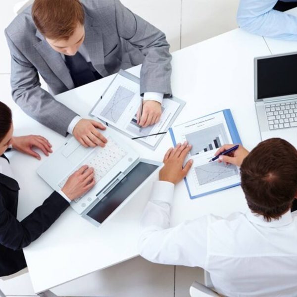 top-view-co-workers-planning-strategy_1098-2959